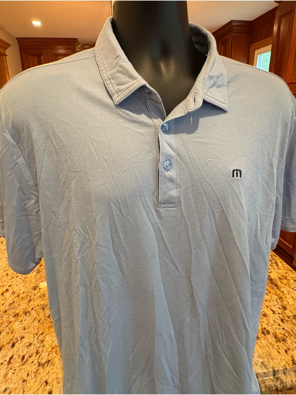 Travis Mathew men’s golf polo. sharp Light Blue with Logos on chest/back. XL
